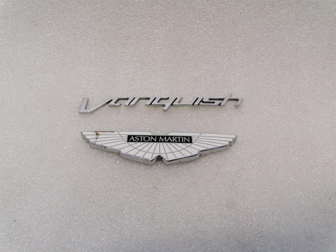 ASTON MARTIN VANQUISH AM310 CD33-407A74-BB REAR LOGOS BADGE ASSEMBLY WINGS