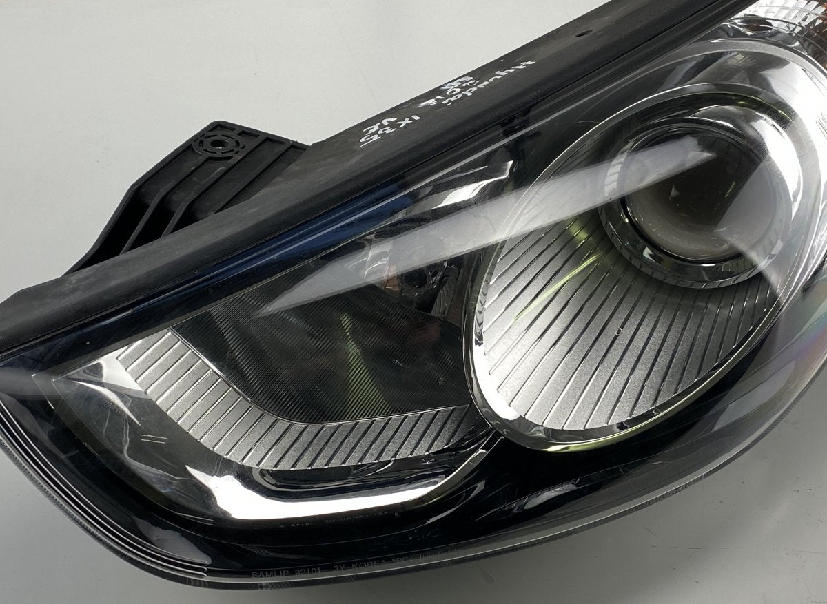 921012Y000 Headlight left HYUNDAI TUCSON II / ix35 I (LM) (2009-2017)