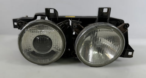 reflektor lewy 63121391321 0301384202 83515669 BMW 5 (E34) (1987-1997)