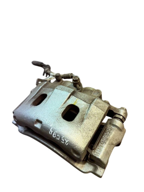 MB3C2B557FF Brake caliper Front left FORD RANGER (TKE) (04.11-)