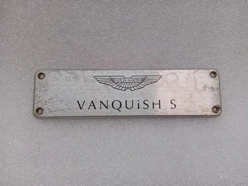ASTON MARTIN VANQUISH S 04-07 V12 VANQUISH S LOGO DOOR POST PLATE